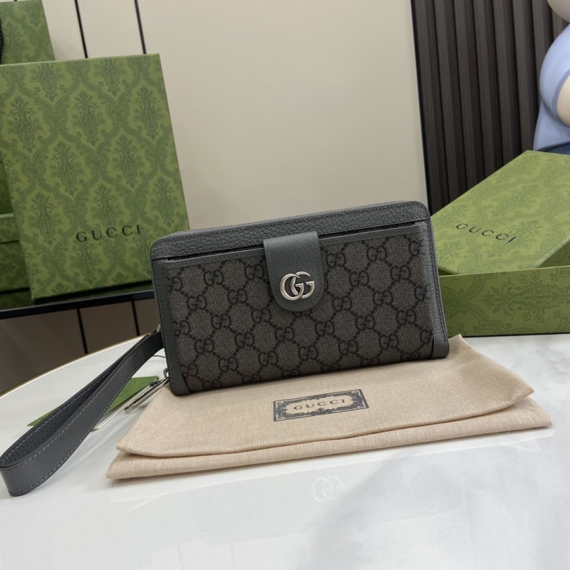 G*u*i clutch bags